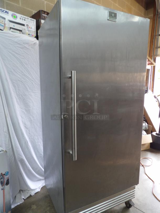 Kenmore commercial refrigerator, model KFS22 ORHY2, on castors, stainless steel finish, powers on and cools, gently used.