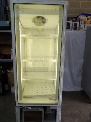 Standex Commercial Single Glass Reach In Freezer Merchandiser! With Poly Coated Racks! 115/220V 1 Phase! Powers on but doesn't seem to Cool! - Item #1207430