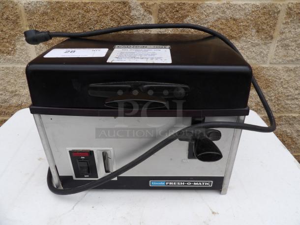 Lincoln Fresh-O-Matic 4000 countertop steamer, black and stainless, 115v 1ph, tested and working. Visible power cord and control panel.