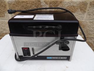 Lincoln Fresh-O-Matic 4000 countertop steamer, black and stainless, 115v 1ph, tested and working. Visible power cord and control panel.