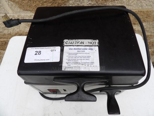 Lincoln Fresh-O-Matic 4000 Countertop Steamer, 115v 1ph, tested and working, features caution label and instructions for use.