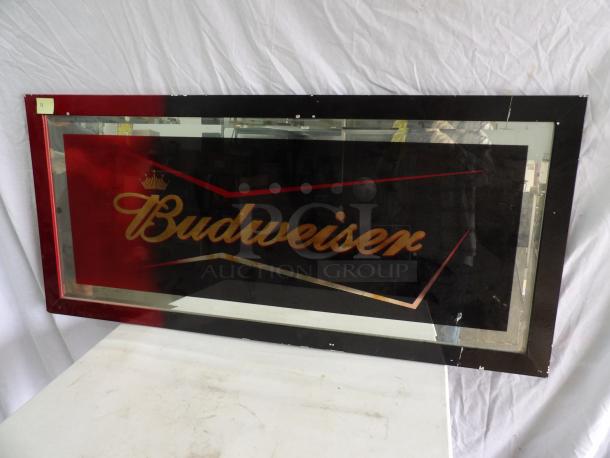 Budweiser mirror, 57x24 inches, features red and black border with logo. Minor wear visible on frame.