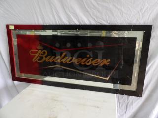 Budweiser mirror, 57x24 inches, features red and black border with logo. Minor wear visible on frame.