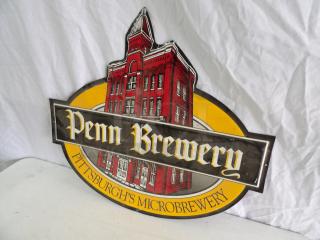 Penn Brewery metal sign, 21x18.5 inches, featuring red historic building, "Pittsburgh's Microbrewery" text, good condition.