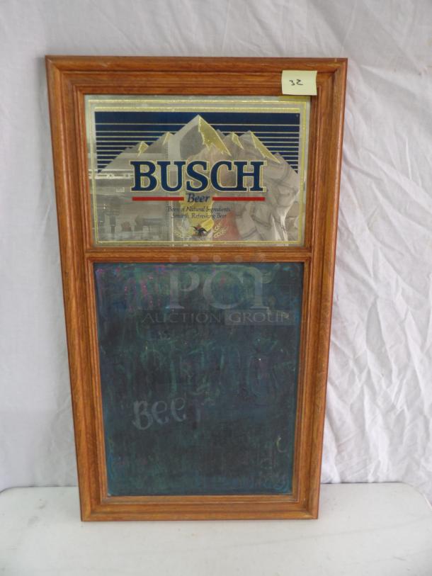 Busch Beer chalk board with wooden frame, 17x31 inches. Features Busch branding and mountain graphic. Vintage condition.