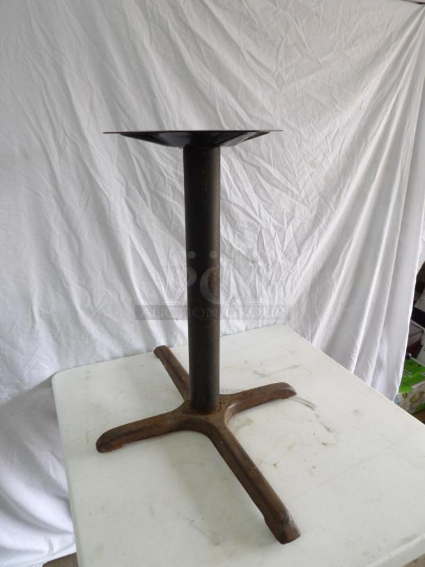 Metal table base with 11-1/2" square mounting platform, dimensions 22x30x29. Rusted finish, sturdy construction.