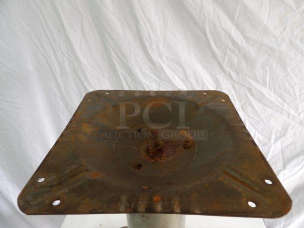 Rustic metal table base with 9.5" square mounting platform, visible rust, suitable for restoration, dimensions 16x22x28x9.5.
