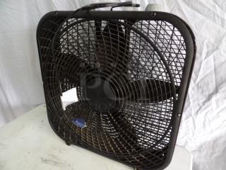 Box fan, Lasko brand, three-speed, black, visible power cord, appears used but functional.