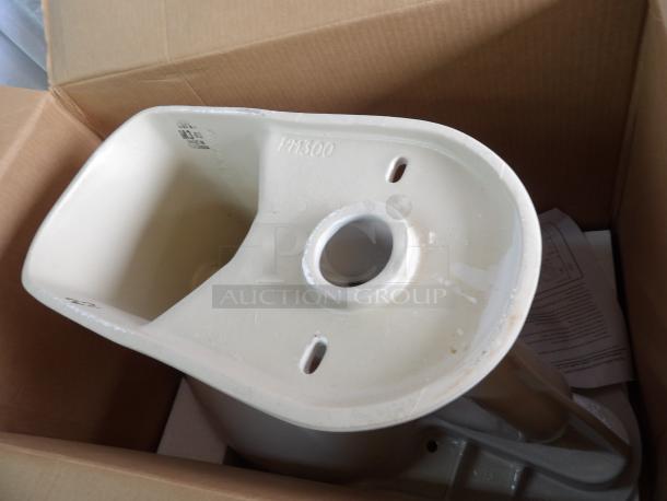 New Mansfield Adriatic elongated toilet bowl, model 1319, 19x16x19 inches, comfort height, shown in a box, no seat included.
