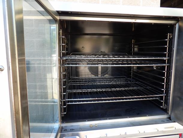 DCS FSCO-1EM240 stainless steel convection oven, view-through door, metal racks, thermostatic controls, 208/240V, 3 phase.