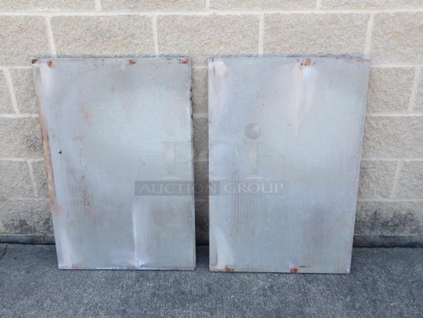 Two rectangular pizza stones with a worn surface, used condition, suitable for Blodgett commercial pizza oven.