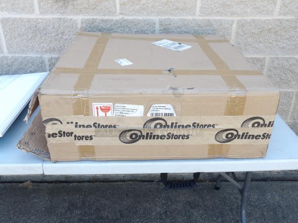 Boxed James Industry Ultra-thin Panel Light, Model ZY-P4-40W-CDS, for 2x2 ceiling replacement. Box shows Online Stores branding.