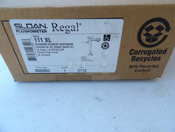 New in box Sloan 111XL Manual Top Spud Single Flush Valve, 1.6 gpf, chrome, 11-1/2" rough-in, 1" IPS inlet. Box label details model and specs.