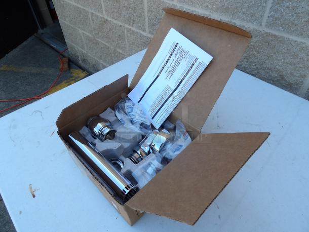 New Sloan 111XL flush valve in open box, chrome finish, 1.6 gpf, 1 in IPS inlet, includes manual and parts, pristine condition.