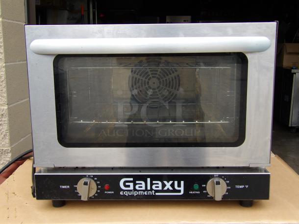 Galaxy CE model 177COE3Q stainless steel 1/4 size convection oven, 120V, 1440W. Features timer and temperature dials.