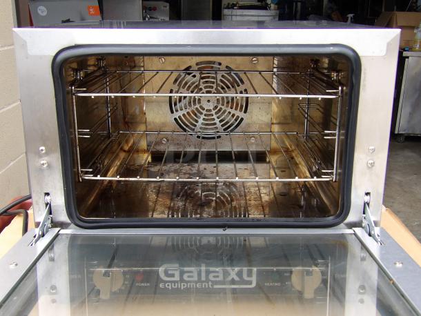 Galaxy CE Stainless Steel 1/4 Size Convection Oven, Model 177COE3Q, showing interior, 120V, 1440W, used condition.