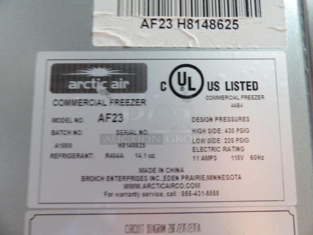 Arctic Air AF23 label showing model, serial number R1418625, UL certification, and electrical specifications.