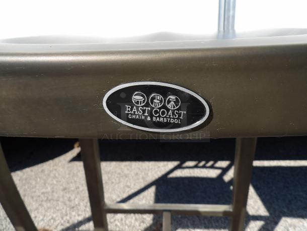 Upscale East Coast metal bar height chair with seat height of 31.5 inches, features durable build, brand label visible.
