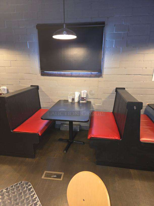 Double booth with red removable cushions, solid wood, paintable, includes removable dividers. Excellent condition.