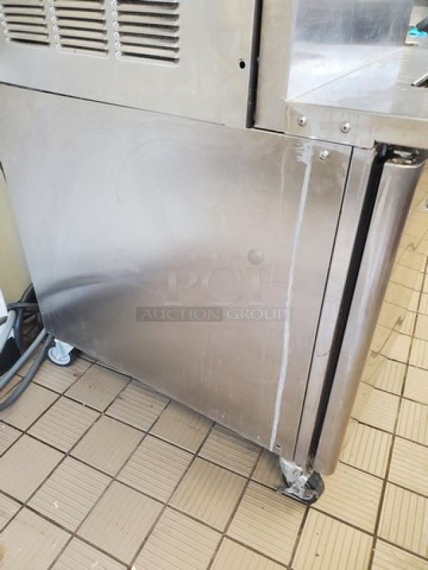 Stoelting DQU431-40912 soft serve freezer, stainless steel, remote air cool, two 8-gallon hoppers, 208 230/3 V, visible wear.