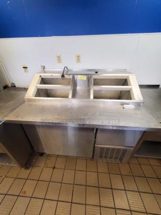 Nor-Lake ZF122SAS/0-2DQ 54" ice cream topping cabinet, stainless steel, dual compartments, good condition.
