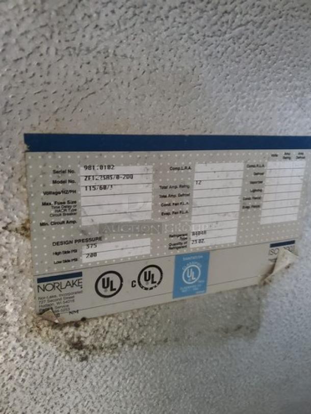 Nor-Lake ZF122SAS/0-2DQ 54" Ice Cream Topping Cabinet label showing model, serial number, and UL certification.