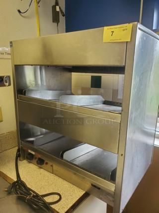 International Dairy Queen DD29 Double Level Food Warmer, stainless steel, visible wear, power cord included.