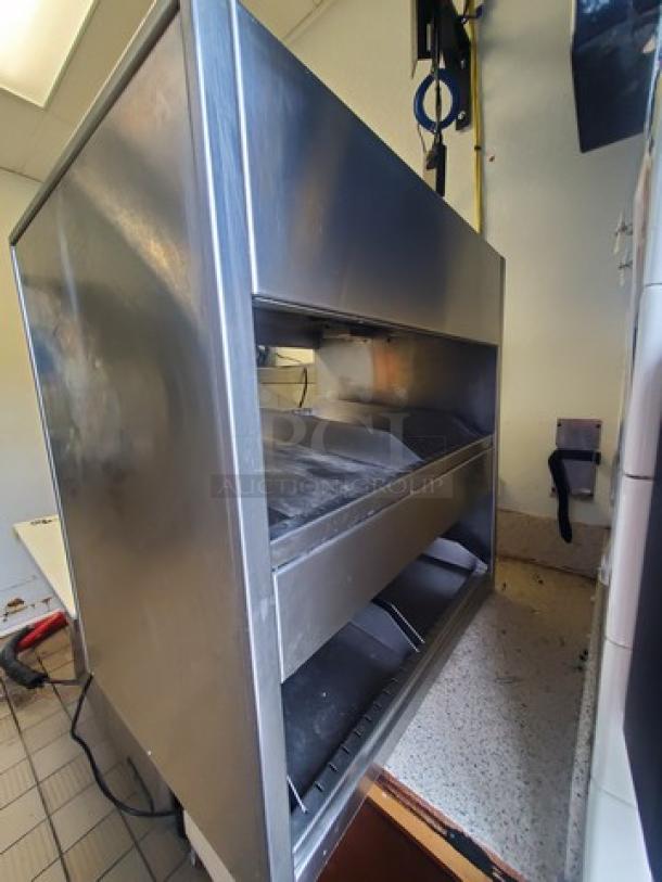 International Dairy Queen DD29 double level food warmer in stainless steel. Used condition with visible signs of use. Model DD29.