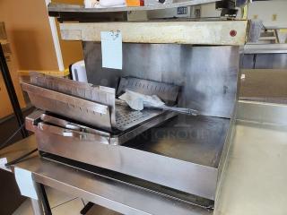 Fried Food Holding Station ORAH-24D, stainless steel, well-used, with perforated tray and visible wear, ideal for commercial kitchens.