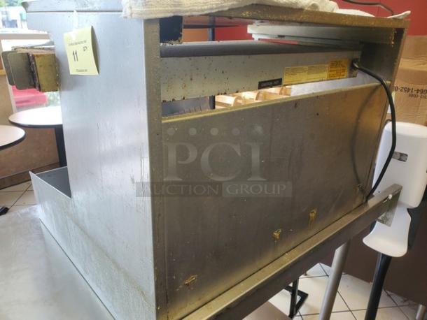 Fried Food Holding Station, Model ORAH-24D, stainless steel, used condition, visible labels with operating instructions.