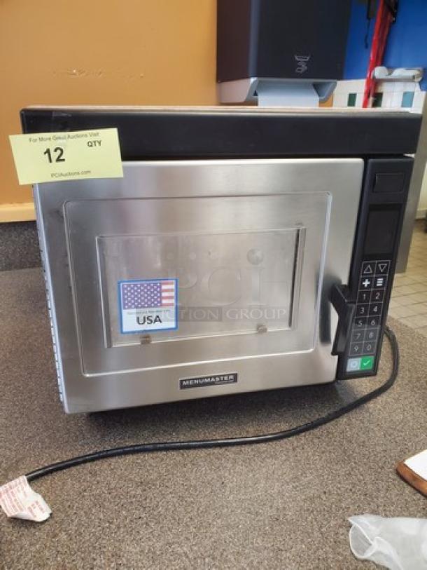 Amana Menumaster Commercial Microwave Oven, model DQ22HSI3, with digital keypad. Features USA sticker; appears in good condition.
