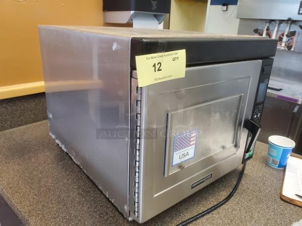 Amana Menumaster DQ22HSI3 commercial microwave oven, stainless steel, used condition, features digital controls, visible USA label.