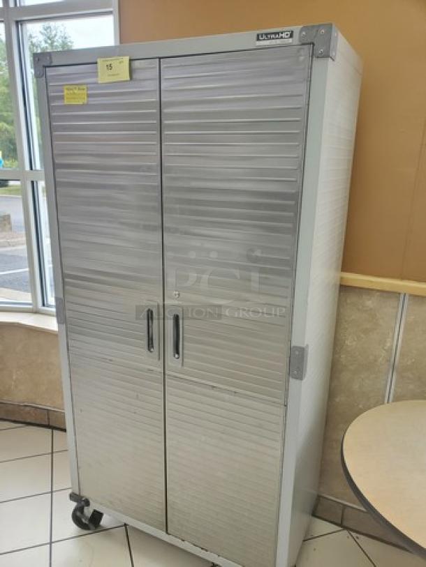 Seville Classics UltraHD Storage Cabinet, metal, dual-door, on wheels, model UltraHD, sturdy condition with visible logo.
