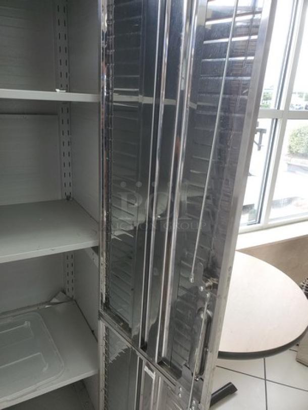 Seville Classics UltraHD Storage Cabinet with sleek metal finish, adjustable shelving, and secure lock. Excellent condition.