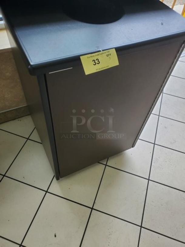 Lot of 4 wooden waste receptacles, dark finish, rectangular design, top opening, label marked "33 QTY," good condition.