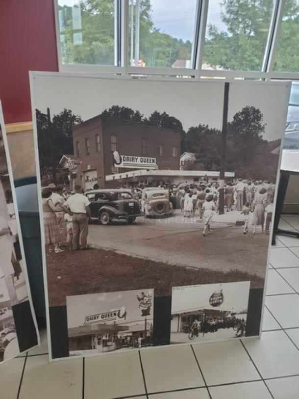 Vintage-style wall decor featuring an early Dairy Queen scene; sepia-toned, showing crowd and classic cars.