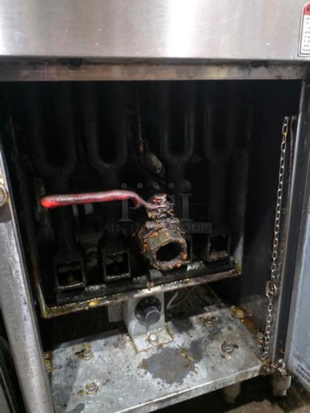 Cecilware Pro FMS504 Natural Gas Floor Fryer, 120,000 BTU, visible interior, used condition, signs of oil residue.