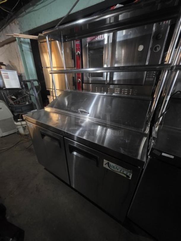 Avantco 47" 2 Door Refrigerated Sandwich Prep Table, model 178APT48HC, stainless steel, two shelves, used condition.