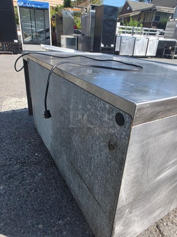 Silver King Chef Base Refrigerator SKRCB50H, 50", 115v, stainless steel, 2-drawer, flat top, used condition, power cord visible.