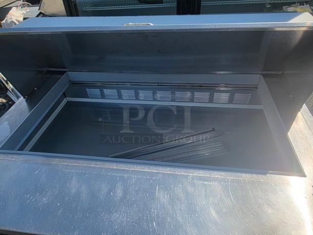 Beverage-Air SPE48HC-18M Mega-Top Sandwich Prep Table, stainless steel, open top showing spacious interior, excellent condition.