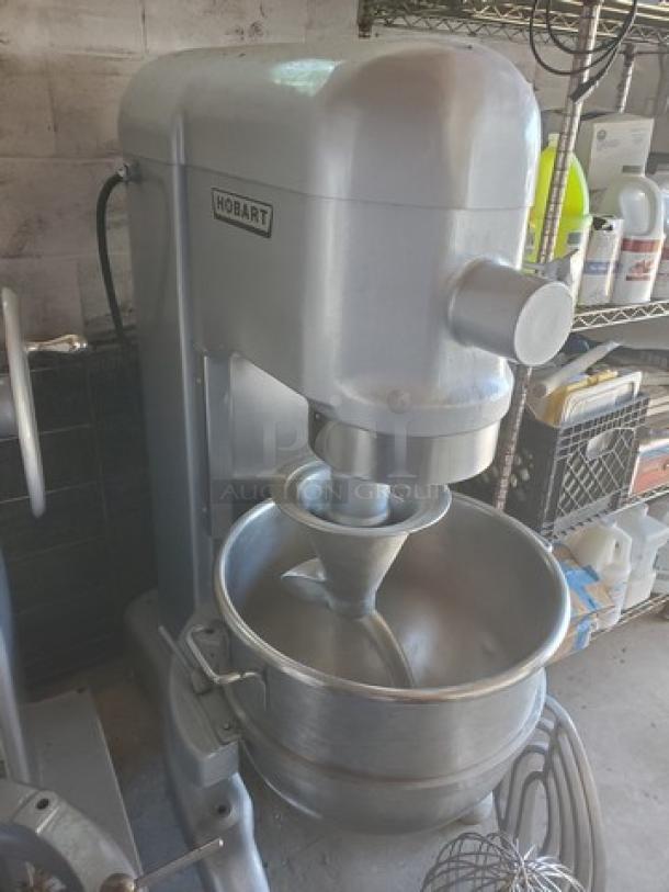 Hobart 80 Qt Mixer Model L 800, 1.5 HP, 230 V, with attachments; needs new plug; features durable stainless steel bowl.
