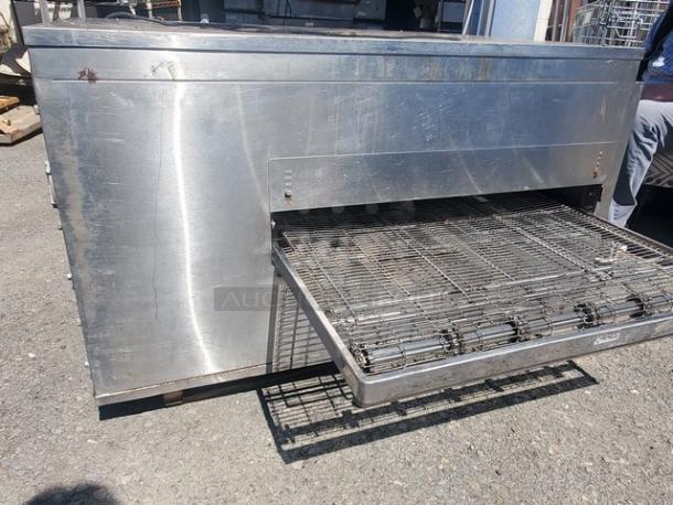 Lincoln Impinger 1450 Pizza Conveyor Oven, stainless steel, natural gas, 120 VAC, used condition, visible wear.