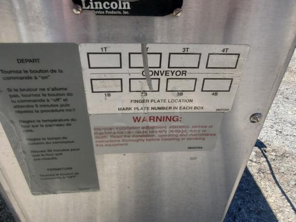 Lincoln Impinger 1450 Pizza Conveyor Oven, natural gas, 120 VAC, 1 PH, 60 Hz, 5 Amps, 70,000-120,000 BTU, with label warnings.