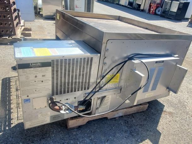 Lincoln Impinger 1450 Pizza Conveyor Oven, natural gas, 120 VAC, 70,000-120,000 BTU, stainless steel exterior, good condition.
