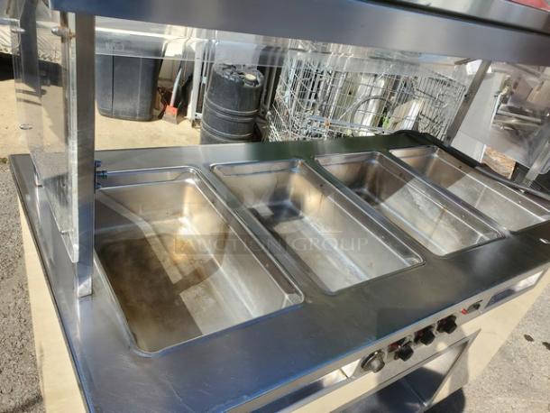 Colorpoint 5E4-CPA-EB 4-Well Electric Steam Table, stainless steel, 208 V, 1 PH, 60 Hz, showing control knobs and wells.