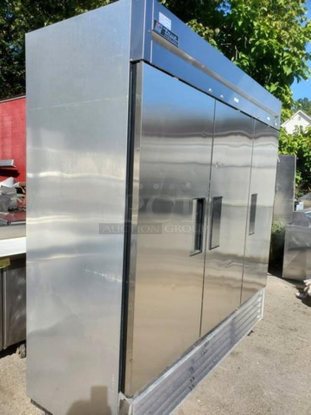 True T-72F T-Series 3-section solid door reach-in freezer in stainless steel. Features durable construction and ample storage.