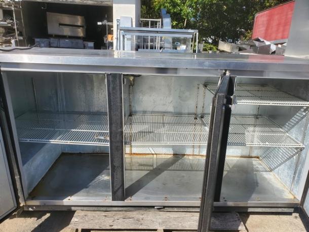 Beverage Air BB78 black three-door back bar refrigerator, 78", shelving visible, well-maintained, 115V, 1 PH, 60 Hz.