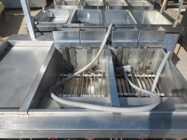 Hobart 3HFD50 electric fryer with 2 wells and 1 dump station. 208V, 3PH, 60Hz. Stainless steel, used condition.