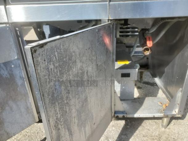Hobart 3HFD50 Electric Fryer with 2 wells, 1 dump station. 208V, 3PH, 60 Hz. Visible wear on the exterior.