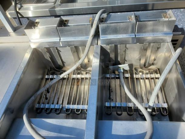Hobart 3HFD50 Electric Fryer with 2 wells and 1 dump station, 208V, 3PH, 60 Hz, stainless steel construction, visibly clean.